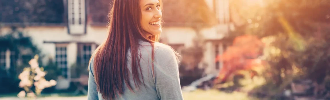 Smiling woman enjoying the countryside